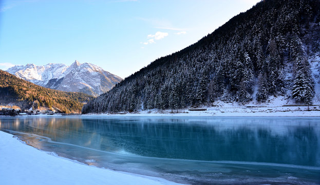 frozen lake in the mountains - Powered by Adobe