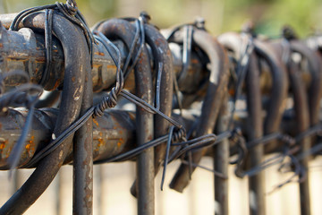 Strapping steel bars with wire in various forms. Deformed steel fastened with steel wire, reinforcement steel rod and deformed bar, selective focus.