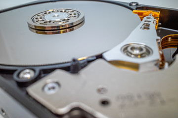 a screwed-on hard disk shows the inner workings of a hard disk