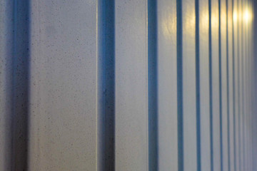Fototapeta premium detail of a wall made of shimmering corrugated iron