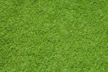 Texture of top view fake green grass for background or backdrop.