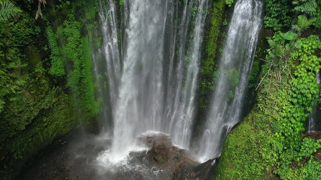 Aerial departure away from the Tiu Kelep waterfall in Indonesia.
