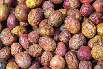 Close-up of red plums, dried jujubes