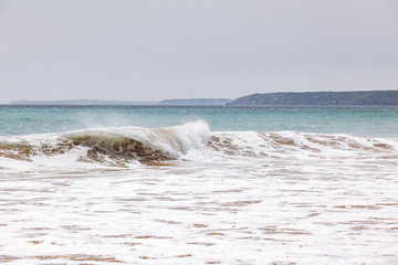 Beautiful sea waves. Waves on a Sunny day. View of the waves from above