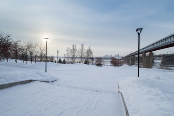 Fototapeta na wymiar Novosibirsk embankment in winter, all covered with snow