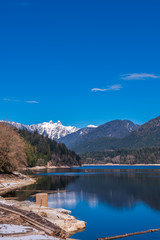 View at Mountain Lake with Blue Sky in British Columbia, Canada.