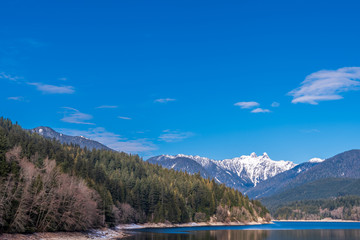 Naklejka na ściany i meble View at Mountain Lake with Blue Sky in British Columbia, Canada.