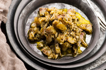 Herring salad with garlic, herbs and olive oil