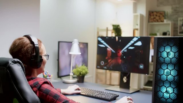 Woman with red hair upset she lost on a shooter online game