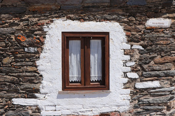 Window in a traditional Portuguese stone house