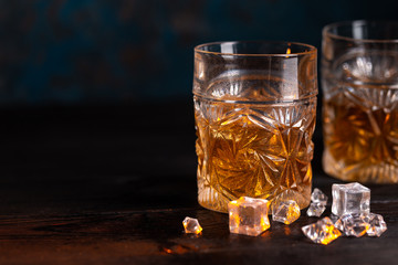 Whiskey in glass with ice