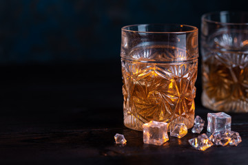 Whiskey in glass with ice
