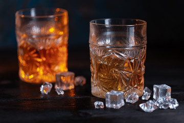 Whiskey in glass with ice