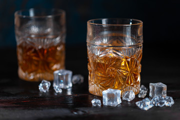 Whiskey in glass with ice