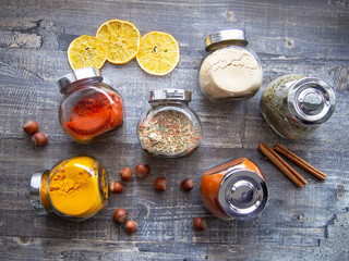 Bright aromatic spices in glass jars