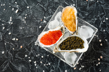 chic expensive red caviar, pike caviar and black caviar for a snack