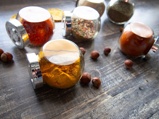 Bright aromatic spices in glass jars