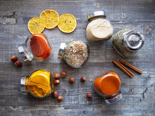 Fototapeta na wymiar Bright aromatic spices in glass jars