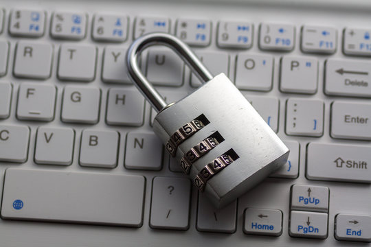 Closeup padlock on computer keyboard for concept technology security