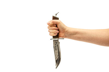 Hunting knife in a female hand isolated on a white background. Dagger in a female hand on a white...
