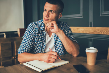 Calm author thinking ideas for article in room