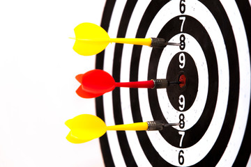 Dartboard with dart arrow hitting the center. Marketing concept.