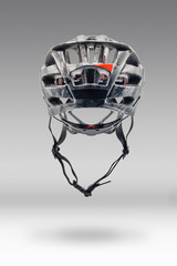 Studio Shot of Gray Camouflage Color Cycling Helmet. Back View of Protective Sports Equipment