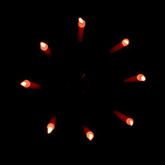 eight candle holder red candle flames