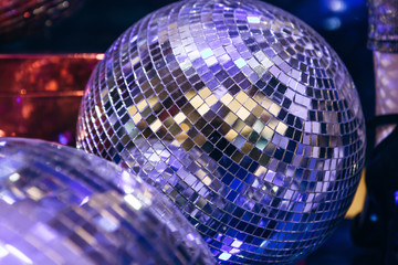 Mirrored glowing disco ball. Retro disco or decoration