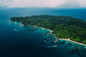 Aerial Drone View of a tropical island with lush jungle in Costa Rica, Isla del Caño