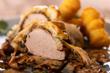 pork filet in puff pastry with croquettes