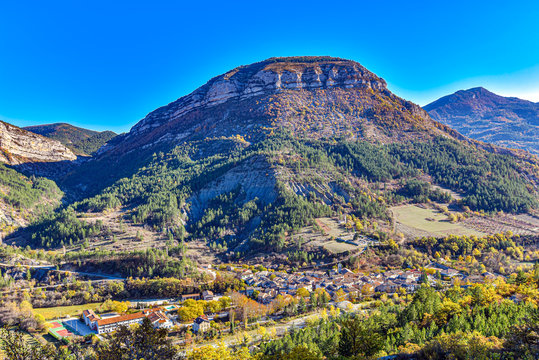 Remuzat village in Baronnies area in Southern France. Des Gravieres mountain is at background. Drome, Auvergne-Rhone-Alpes region.