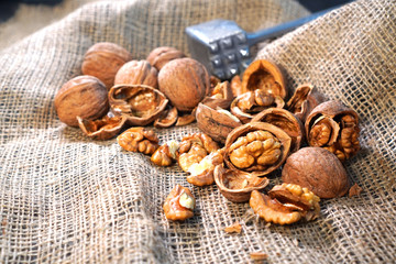 Fresh chopped walnuts on the sackcloth