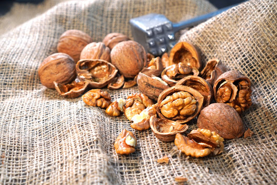 Fresh chopped walnuts on the sackcloth