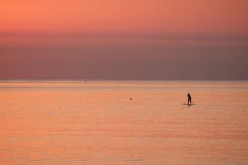 silhouette of a standup paddler in Barcelona Spain, Catalonia