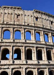 Colosseo with blue sky. Rome, Italy.