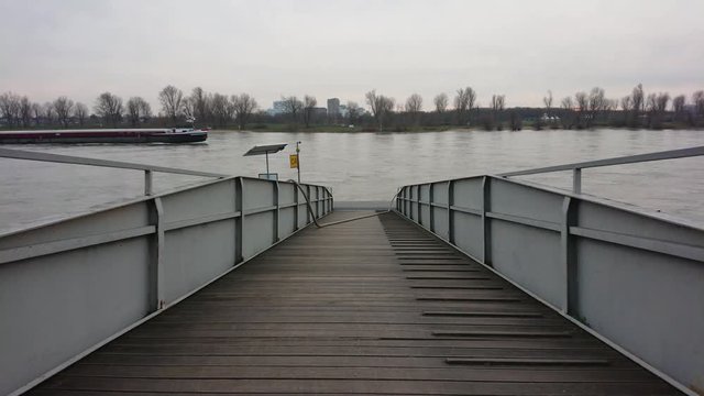 Coaster crossing over river with big ramp on foreground