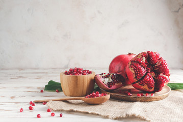 Tasty juicy pomegranate on table