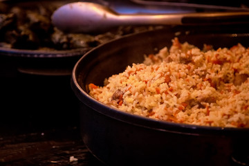 large pan with rice and meat