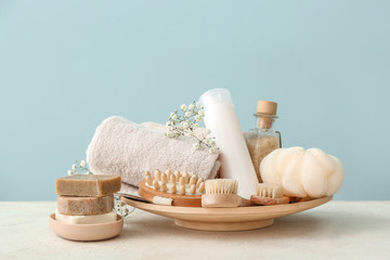 Fototapeta na wymiar Set of bath accessories on white table