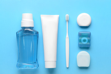 Set for dental hygiene on color background