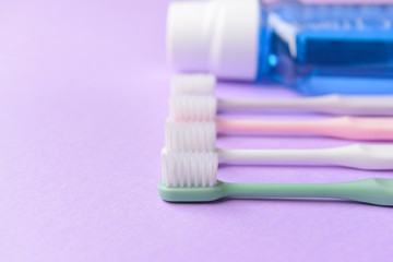 Set for dental hygiene on color background
