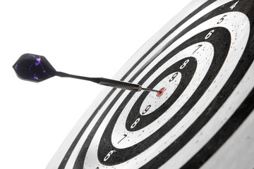 Dartboard with hit bullseye on white background