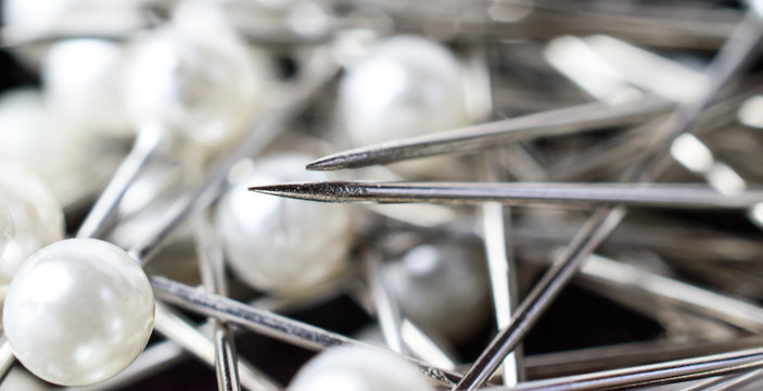 Closeup of sharp straight pin needle