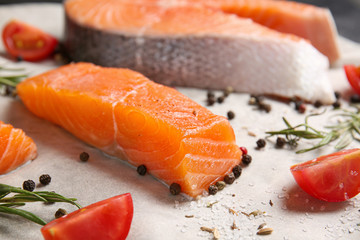 Fresh raw salmon on table, closeup