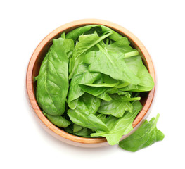 Bowl with fresh spinach on white background