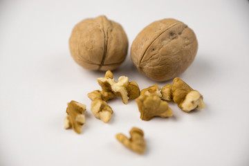 closeup walnuts on a white surface