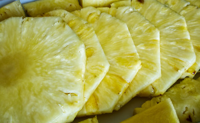 Close up of pineapple slices. Macro image