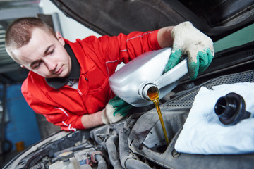 Fototapeta premium automobile car oil replacement work