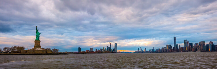 New York City Manhattan skyline panorama and cityscape from Hudson with Liberty Statue